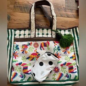 Super cute fabric tote with cosmetic bag.